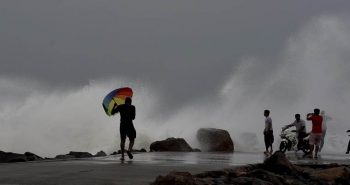 Chennai: Tidel waves are seen rising high at the Ennore Beach in Chennai on Sunday. Cyclone Vardah's severe cycle is around 450 km east-north-east of Chennai and is likely to make landfall north of Chennai in the afternoon or evening of December 12. PTI Photo(PTI12_11_2016_000227B)